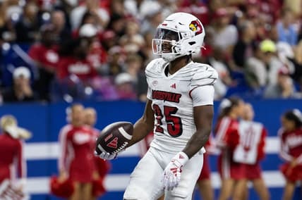 Sep 16, 2023; Indianapolis, Indiana, USA; Louisville Cardinals running back Jawhar Jordan (25) celebrates after scoring a touchdown against the Indiana Hoosiers in the second quarter at Lucas Oil Stadium. Mandatory Credit: Trevor Ruszkowski-USA TODAY Sports