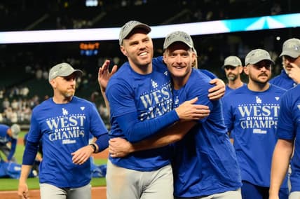 Sep 16, 2023; Seattle, Washington, USA; The Los Angeles Dodgers celebrate after winning the National League West division after the game against the Seattle Mariners at T-Mobile Park. Mandatory Credit: Steven Bisig-USA TODAY Sports