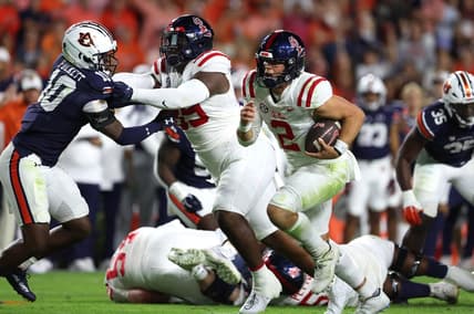 Oct 21, 2023; Auburn, Alabama, USA;  Mississippi Rebels quarterback Jaxson Dart (2) carries against the Auburn Tigers during the first quarter at Jordan-Hare Stadium. Mandatory Credit: John Reed-USA TODAY Sports