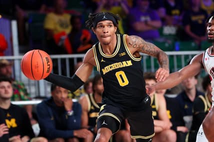 Nov 24, 2023; Paradise Island, BAHAMAS;  Michigan Wolverines guard Dug McDaniel (0) passes the ball during the second half against the Texas Tech Red Raiders at Imperial Arena. Mandatory Credit: Kevin Jairaj-USA TODAY Sports