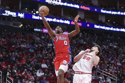 Dec 29, 2023; Houston, Texas, USA; Philadelphia 76ers guard Tyrese Maxey (0) shoots the ball as Houston Rockets center Alperen Sengun (28) defends during the third quarter at Toyota Center. Mandatory Credit: Troy Taormina-USA TODAY Sports