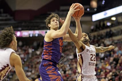 Jan 20, 2024; Tallahassee, Florida, USA; Florida State Seminoles guard Darin Green Jr (22) pressures Clemson Tigers center PJ Hall (24) during the first half at Donald L. Tucker Center. Mandatory Credit: Melina Myers-USA TODAY Sports