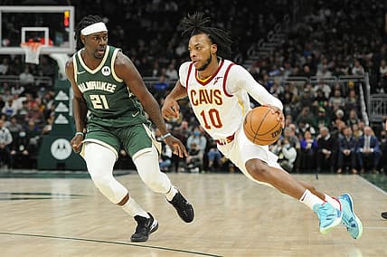 Dec 6, 2021; Milwaukee, Wisconsin, USA;  Cleveland Cavaliers guard Darius Garland (10) drives to the basket against Milwaukee Bucks guard Jrue Holiday (21) in the first quarter at Fiserv Forum. Mandatory Credit: Michael McLoone-USA TODAY Sports
