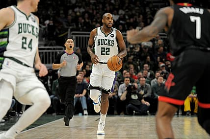 Dec 22, 2021; Milwaukee, Wisconsin, USA;  Milwaukee Bucks forward Khris Middleton (22) brings the ball up court against Houston Rockets int the first half at Fiserv Forum. Mandatory Credit: Michael McLoone-USA TODAY Sports