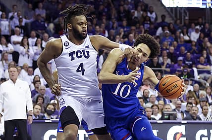 Mar 1, 2022; Fort Worth, Texas, USA;  Kansas Jayhawks forward Jalen Wilson (10) drives to the basket as TCU Horned Frogs center Eddie Lampkin (4) defends during the second half at Ed and Rae Schollmaier Arena. Mandatory Credit: Kevin Jairaj-USA TODAY Sports