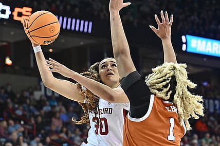 Mar 27, 2022; Spokane, WA, USA; Stanford Cardinal guard Haley Jones (30) shoots the ball against Texas Longhorns center Lauren Ebo (1) in the Spokane regional finals of the women's college basketball NCAA Tournament at Spokane Veterans Memorial Arena. Mandatory Credit: James Snook-USA TODAY Sports