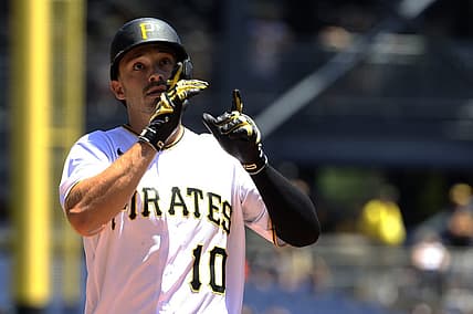Jun 23, 2022; Pittsburgh, Pennsylvania, USA;  Pittsburgh Pirates center fielder Bryan Reynolds (10) reacts crossing home plate on a solo home run against the Chicago Cubs during the first inning at PNC Park. Mandatory Credit: Charles LeClaire-USA TODAY Sports