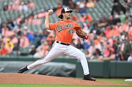 Jul 9, 2022; Baltimore, Maryland, USA; Baltimore Orioles starting pitcher Dean Kremer (64) throws a first inning pitch against the Los Angeles Angels  at Oriole Park at Camden Yards. Mandatory Credit: Tommy Gilligan-USA TODAY Sports