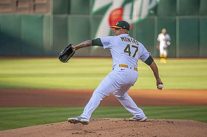 Jul 26, 2022; Oakland, California, USA; Oakland Athletics starting pitcher Frankie Montas (47) throws a pitch against the Houston Astros during the first inning at RingCentral Coliseum. Mandatory Credit: Ed Szczepanski-USA TODAY Sports