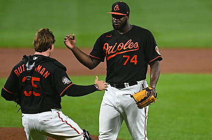 Aug 5, 2022; Baltimore, Maryland, USA;  Baltimore Orioles relief pitcher Felix Bautista (74) celebrates with  catcher Adley Rutschman (35) after the game against the Pittsburgh Pirates at Oriole Park at Camden Yards. Mandatory Credit: Tommy Gilligan-USA TODAY Sports