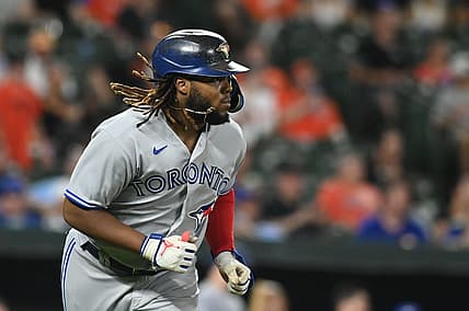 Aug 9, 2022; Baltimore, Maryland, USA; Toronto Blue Jays first baseman Vladimir Guerrero Jr. (27) runs out a sixth inning single against the Baltimore Orioles  at Oriole Park at Camden Yards. Mandatory Credit: Tommy Gilligan-USA TODAY Sports