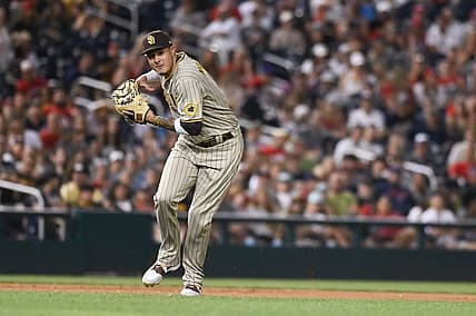Aug 13, 2022; Washington, District of Columbia, USA; San Diego Padres third baseman Manny Machado (13) looks to throw to first base during the eighth inning against the Washington Nationals  at Nationals Park. Mandatory Credit: Tommy Gilligan-USA TODAY Sports