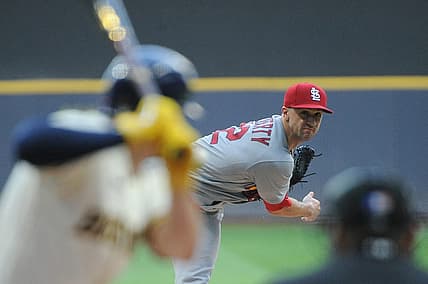 Jun 21, 2022; Milwaukee, Wisconsin, USA;  St. Louis Cardinals starting pitcher Jack Flaherty (22) gives up a home run to Milwaukee Brewers shortstop Willy Adames (27) in the first inning at American Family Field. Mandatory Credit: Michael McLoone-USA TODAY Sports