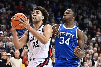 Nov 20, 2022; Spokane, Washington, USA; Gonzaga Bulldogs forward Anton Watson (22) shoots the ball against Kentucky Wildcats forward Oscar Tshiebwe (34) in the second half at Spokane Arena. Gonzaga won 88-72. Mandatory Credit: James Snook-USA TODAY Sports