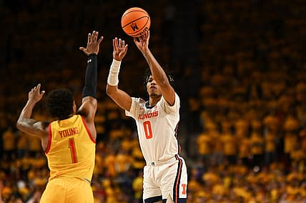 Dec 2, 2022; College Park, Maryland, USA;  Illinois Fighting Illini guard Terrence Shannon Jr. (0) shoots over Maryland Terrapins guard Jahmir Young (1) during the first half at Xfinity Center. Mandatory Credit: Tommy Gilligan-USA TODAY Sports