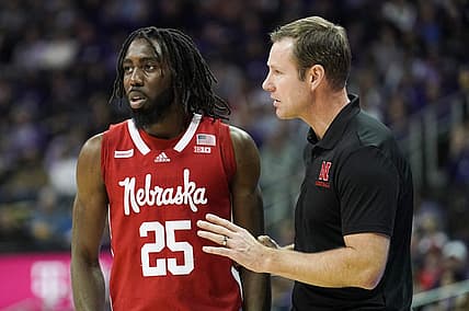 Dec 17, 2022; Kansas City, Missouri, USA; Nebraska Cornhuskers head coach Fred Hoiberg talks with guard Emmanuel Bandoumel (25) against the Kansas State Wildcats during the first half at T-Mobile Center. Mandatory Credit: Denny Medley-USA TODAY Sports