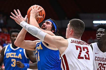 Dec 30, 2022; Pullman, Washington, USA; UCLA Bruins guard Jaime Jaquez Jr. (24) shoots the ball against Washington State Cougars forward Andrej Jakimovski (23) in the second half at Friel Court at Beasley Coliseum. Bruins won 67-66. Mandatory Credit: James Snook-USA TODAY Sports