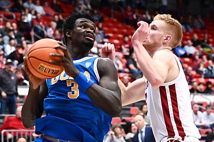 Dec 30, 2022; Pullman, Washington, USA; UCLA Bruins forward Adem Bona (3) shoots the ball against Washington State Cougars guard Jabe Mullins (3) in the second half at Friel Court at Beasley Coliseum. Bruins won 67-66. Mandatory Credit: James Snook-USA TODAY Sports