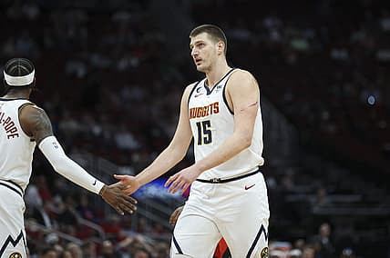 Feb 28, 2023; Houston, Texas, USA; Denver Nuggets center Nikola Jokic (15) reacts after a play during the first quarter against the Houston Rockets at Toyota Center. Mandatory Credit: Troy Taormina-USA TODAY Sports