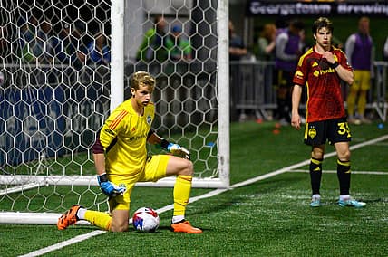 Apr 26, 2023; Tukwila, WA, USA; Seattle Sounders goalkeeper Stefan Cleveland (30) guards the ball during the game against the San Diego Loyal at Starfire Sports. Mandatory Credit: Steven Bisig-USA TODAY Sports