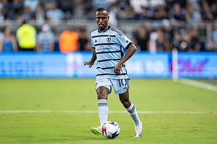 Aug 4, 2023; Kansas City, KS, USA; Sporting Kansas City midfielder Gadi Kinda (10) passes the ball during the second half against Toluca at Children's Mercy Park. Mandatory Credit: Jay Biggerstaff-USA TODAY Sports