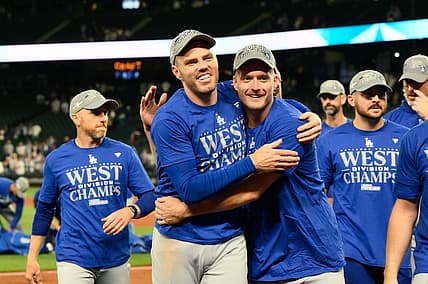 Sep 16, 2023; Seattle, Washington, USA; The Los Angeles Dodgers celebrate after winning the National League West division after the game against the Seattle Mariners at T-Mobile Park. Mandatory Credit: Steven Bisig-USA TODAY Sports