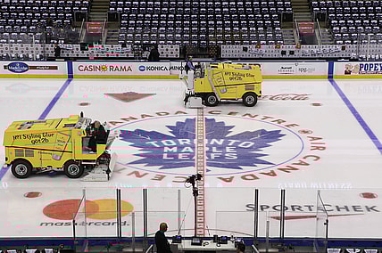 Oct 7, 2017; Toronto, Ontario, CAN; A general view of the logo at center ice as the zambonis clear the ice before the Toronto Maple Leafs home opener against the New York Rangers at Air Canada Centre. Mandatory Credit: Tom Szczerbowski-USA TODAY Sports