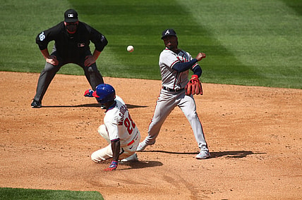 Apr 4, 2021; Philadelphia, Pennsylvania, USA; Atlanta Braves second baseman Ozzie Albies (1) attempts to turn a double play over Philadelphia Phillies left fielder Andrew McCutchen (22) in the third inning at Citizens Bank Park. Mandatory Credit: Kyle Ross-USA TODAY Sports