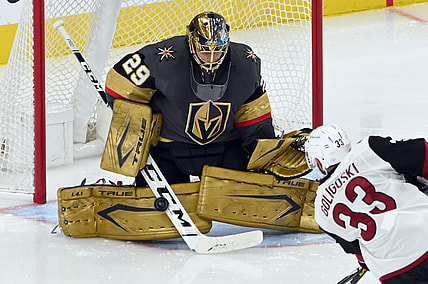Apr 11, 2021; Las Vegas, NV, USA; Vegas Golden Knights goaltender Marc-Andre Fleury (29) blacks a shot by Arizona Coyotes defenseman Alex Goligoski (33) during the second period at T-Mobile Arena. (Mandatory Credit: David Beckeri-USA TODAY Sports via The Associated Press)