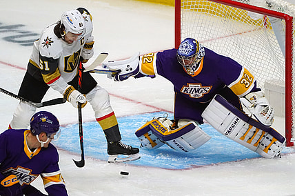 Apr 14, 2021; Los Angeles, California, USA; Vegas Golden Knights right wing Mark Stone (61) moves in for a shot against Los Angeles Kings goaltender Jonathan Quick (32) during the first period at Staples Center. Mandatory Credit: Gary A. Vasquez-USA TODAY Sports