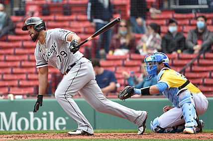 Apr 18, 2021; Boston, Massachusetts, USA; Chicago White Sox first baseman Jose Abreu (79) hits an infield single during the fourth inning of game 1 agains the Boston Red Sox at Fenway Park. Mandatory Credit: Bob DeChiara-USA TODAY Sports