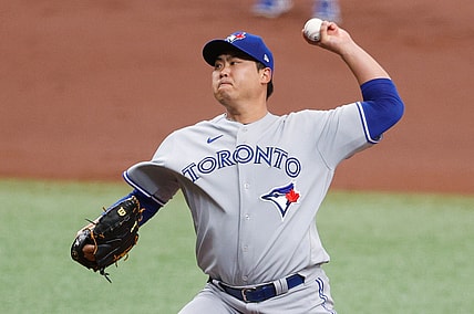 Apr 25, 2021; St. Petersburg, Florida, USA;  Toronto Blue Jays starting pitcher Hyun Jin Ryu (99) throws a pitch in the first inning against the Tampa Bay Rays at Tropicana Field. Mandatory Credit: Nathan Ray Seebeck-USA TODAY Sports