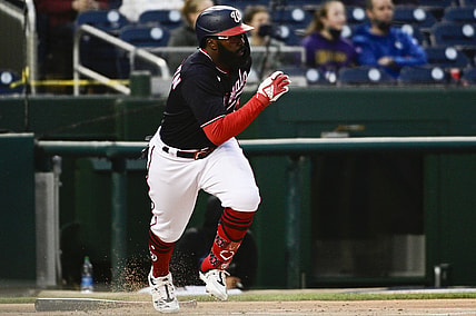 Apr 30, 2021; Washington, District of Columbia, USA;  Washington Nationals second baseman Josh Harrison (5) singles during the first inning against the Miami Marlins at Nationals Park. Mandatory Credit: Tommy Gilligan-USA TODAY Sports