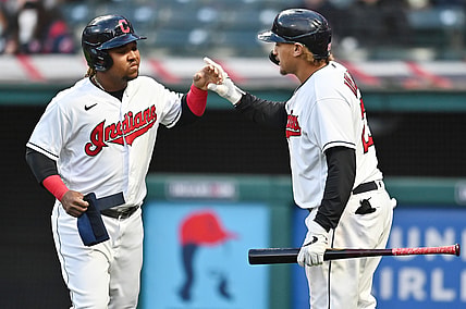 May 8, 2021; Cleveland, Ohio, USA; Cleveland Indians third baseman Jose Ramirez (left) celebrates with right fielder Josh Naylor (22) after scoring against the Cincinnati Reds during the sixth inning at Progressive Field. Mandatory Credit: Ken Blaze-USA TODAY Sports