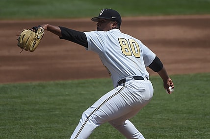 Jun 25, 2021; Omaha, Nebraska, USA; Vanderbilt Commodores starting pitcher Kumar Rocker (80) pitches in the second inning against the NC State Wolfpack at TD Ameritrade Park. Mandatory Credit: Steven Branscombe-USA TODAY Sports