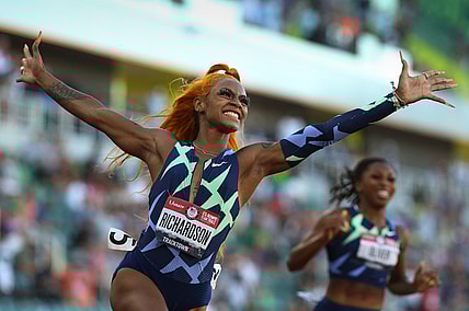 Sha'Carri Richardson, left, celebrates her win in the finals of the women's 100 meter dash at the U.S. Olympic Track & Field Trials at Hayward Field in Eugene.

Eug 061921 Trials 08