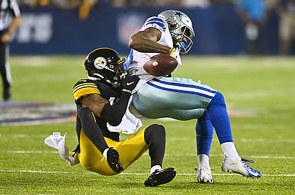 Aug 5, 2021; Canton, Ohio, USA; Pittsburgh Steelers cornerback Mark Gilbert (17) tackles Dallas Cowboys wide receiver Brandon Smith (80) during the second half at Tom Benson Hall of Fame Stadium. Mandatory Credit: Ken Blaze-USA TODAY Sports