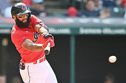 Aug 21, 2021; Cleveland, Ohio, USA; Cleveland Indians shortstop Amed Rosario (1) hits a single during the first inning against the Los Angeles Angels at Progressive Field. Mandatory Credit: Ken Blaze-USA TODAY Sports
