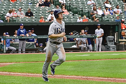 Aug 29, 2021; Baltimore, Maryland, USA;  Tampa Bay Rays third baseman Joey Wendle (18) runs out a sixth inning solo home run against the Baltimore Orioles at Oriole Park at Camden Yards. Mandatory Credit: Tommy Gilligan-USA TODAY Sports