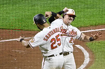 Sep 7, 2021; Baltimore, Maryland, USA;  Baltimore Orioles right fielder Austin Hays (21) celebrates with right fielder Anthony Santander (25)after hitting a two run home run ion the third inning against the Kansas City Royals  at Oriole Park at Camden Yards. Mandatory Credit: Tommy Gilligan-USA TODAY Sports