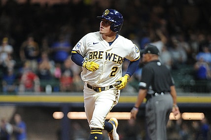 Sep 20, 2021; Milwaukee, Wisconsin, USA;  Milwaukee Brewers third baseman Luis Urias (2) rounds the bases after hitting a home run against the St. Louis Cardinals in the second inning at American Family Field. Mandatory Credit: Michael McLoone-USA TODAY Sports