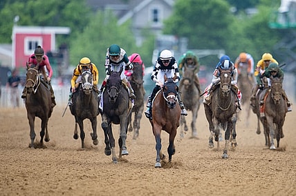 May 20, 2022; Baltimore, MD, USA; Florent Group aboard Interstatedaydream (back and white) wins the running of the Black-Eyed Susan Day at Pimlico Race Course. Mandatory Credit: Tommy Gilligan-USA TODAY Sports