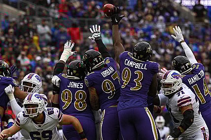 Oct 2, 2022; Baltimore, Maryland, USA;  Buffalo Bills place kicker Tyler Bass (2) first half field goal clears Baltimore Ravens defensive tackle Calais Campbell (93)  tented hand during at M&T Bank Stadium. Mandatory Credit: Tommy Gilligan-USA TODAY Sports