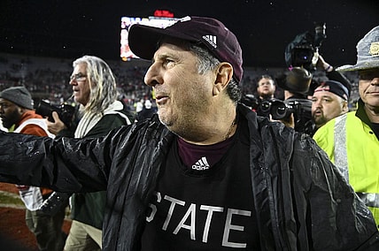 Nov 24, 2022; Oxford, Mississippi, USA; Mississippi State Bulldogs head coach Mike Leach walks onto the field  after the game against the Ole Miss Rebels at Vaught-Hemingway Stadium. Mandatory Credit: Matt Bush-USA TODAY Sports