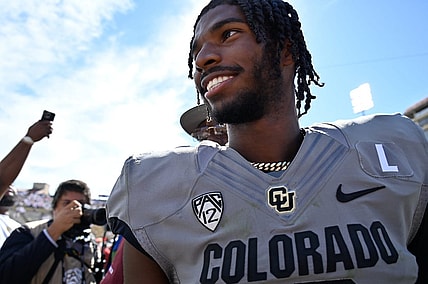 Sep 30, 2023; Boulder, Colorado, USA;  Colorado Buffaloes quarterback Shedeur Sanders (2) smiles as he walks off the field after the game against the USC Trojans at Folsom Field. Mandatory Credit: John Leyba-USA TODAY Sports