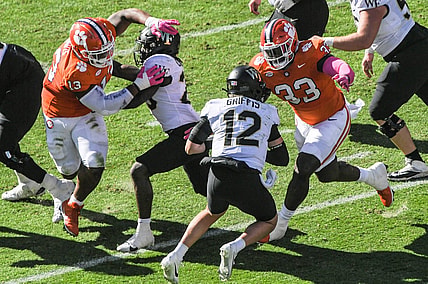 Oct 7, 2023; Clemson, South Carolina, USA; Clemson defensive tackle Ruke Orhorhoro (33) sacks  Wake Forest quarterback Mitch Griffis (12) during the first quarter at Memorial Stadium. Mandatory Credit: Ken Ruinard-USA TODAY Sports