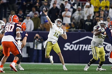 Nov 18, 2023; Atlanta, Georgia, USA; Georgia Tech Yellow Jackets quarterback Haynes King (10) throws a pass against the Syracuse Orange in the first half at Bobby Dodd Stadium at Hyundai Field. Mandatory Credit: Brett Davis-USA TODAY Sports