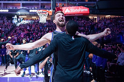 Dec 20, 2023; Sacramento, California, USA; Sacramento Kings forward Domantas Sabonis (10) celebrates with guard De'Aaron Fox (5) during pregame introductions at Golden 1 Center. Mandatory Credit: Ed Szczepanski-USA TODAY Sports
