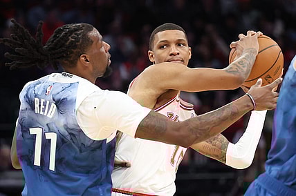 Jan 5, 2024; Houston, Texas, USA; Houston Rockets forward Jabari Smith Jr. (10) is defended by Minnesota Timberwolves center Naz Reid (11) in the second quarter at Toyota Center. Mandatory Credit: Thomas Shea-USA TODAY Sports