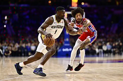 Mar 8, 2024; Philadelphia, Pennsylvania, USA; New Orleans Pelicans forward Zion Williamson (1) drives against Philadelphia 76ers guard Kelly Oubre Jr (9) in the third quarter at Wells Fargo Center. Mandatory Credit: Kyle Ross-USA TODAY Sports